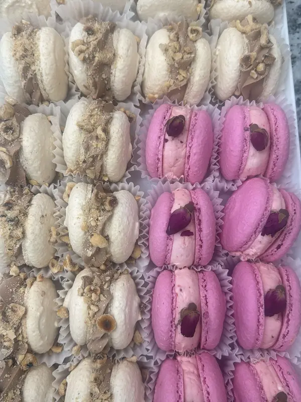 French macarons - pistachio rose, raspberry rose, hazelnut